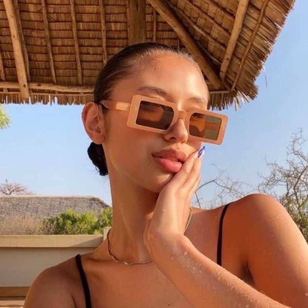 rectangle peach frame sunglasses with brown tinted lens